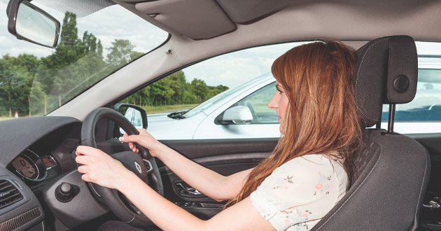 Female driver parking.